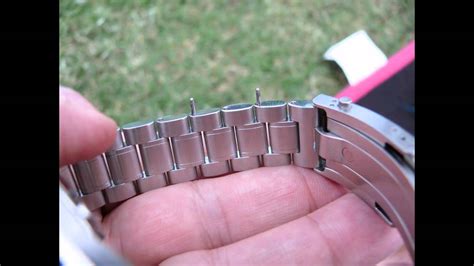 omega speedmaster how to remove links|remove links from omega seamaster watch band.